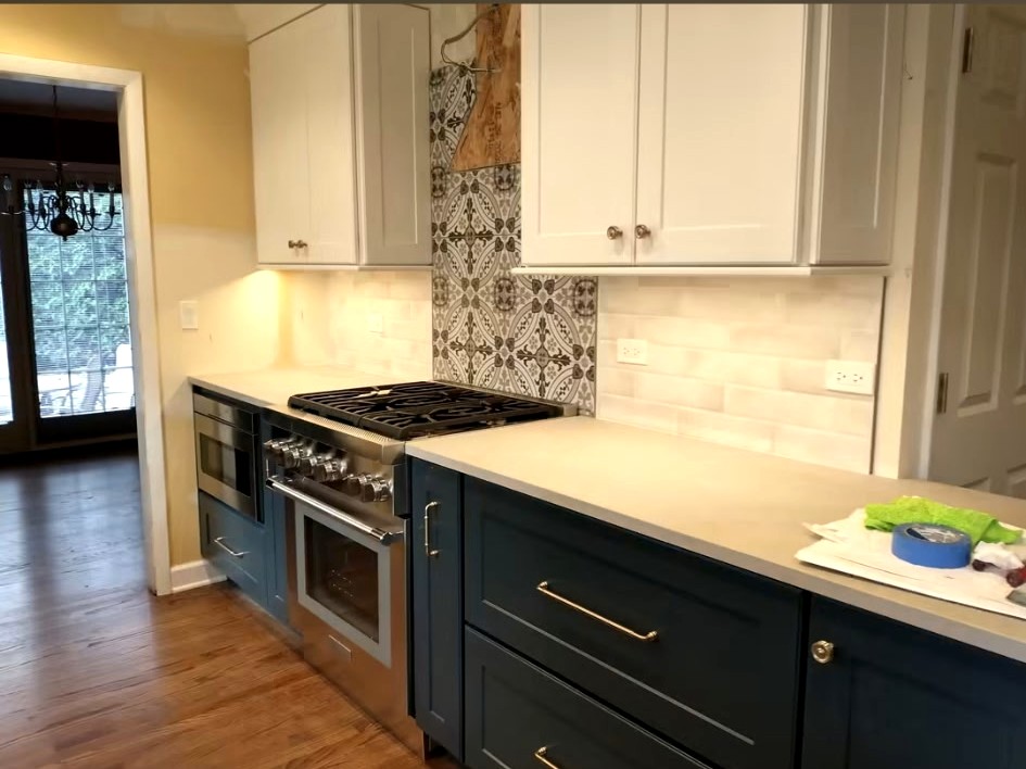Teal Kitchen with Decorative Backsplash